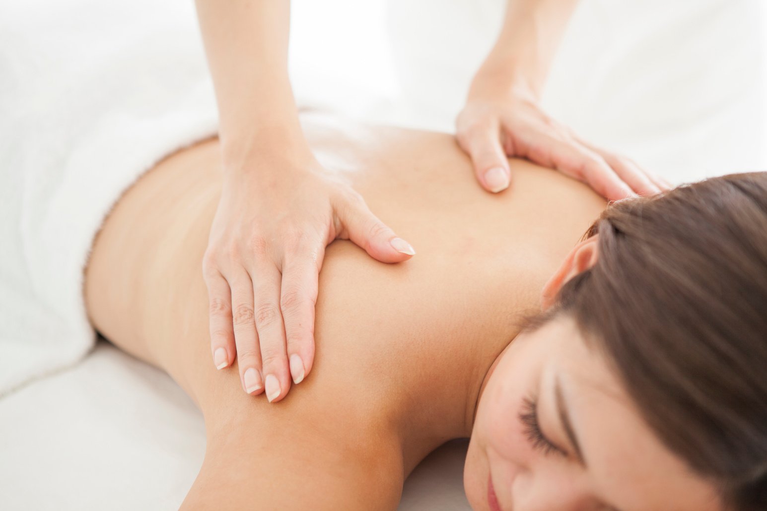 Woman being massaged for beauty with an esthetic salon